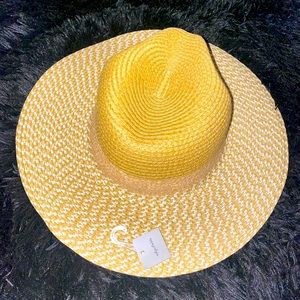 A new day adjustable beach sun hat - trendy for the beach.